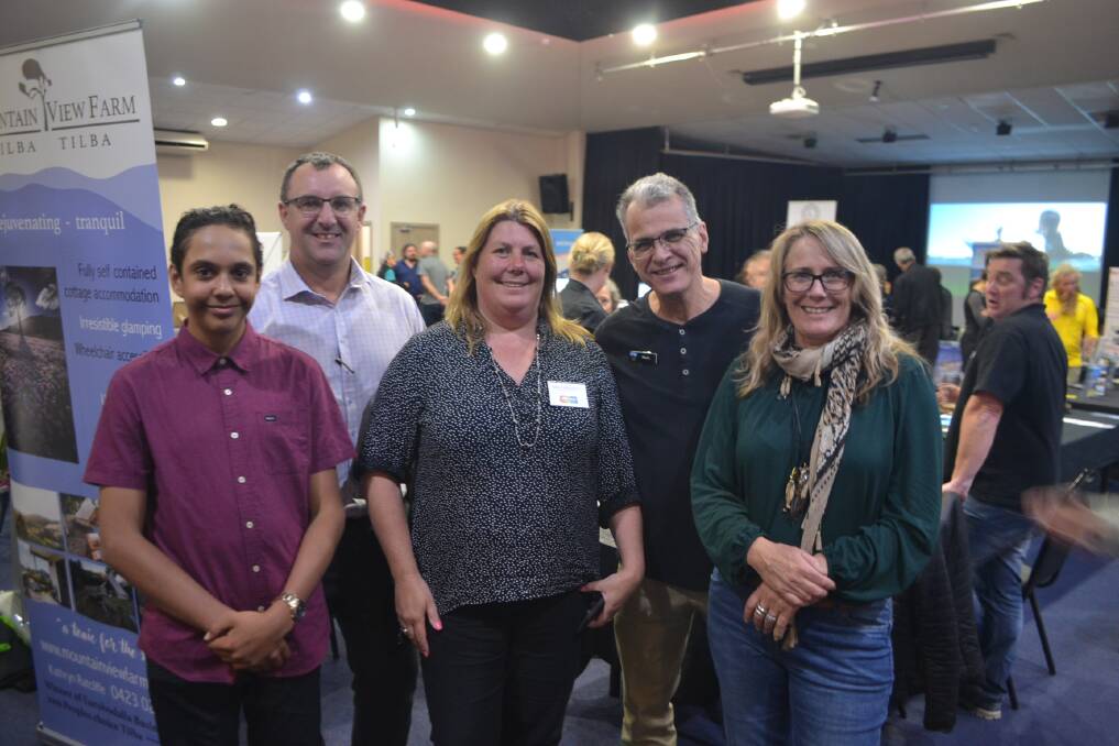 TEAM TOURISM: Layton Moore, Lindsey Usher, Sally Boukley, Matt Deveson and Liz Innes at the expo on Monday evening at Narooma Golf Club.
