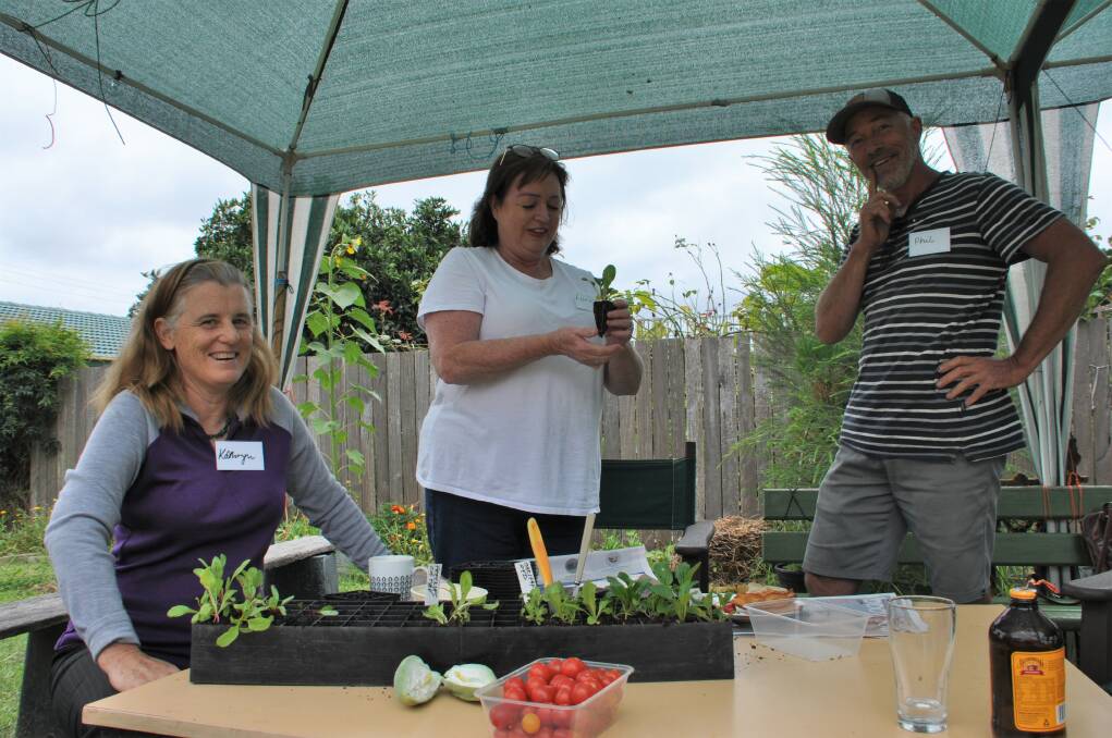Kathryn Maxwell, Lorna Calder and Phil Timms helping inspire bushfire-affected families to reestablish their gardens. 