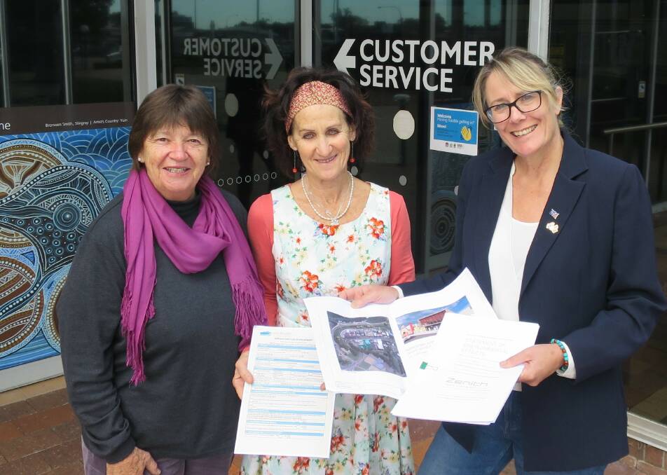 Narooma School of Arts secretary Laurelle Pacey and president Jenni Bourke discuss the NACCs plans with Eurobodalla Shire Council Mayor Liz Innes.