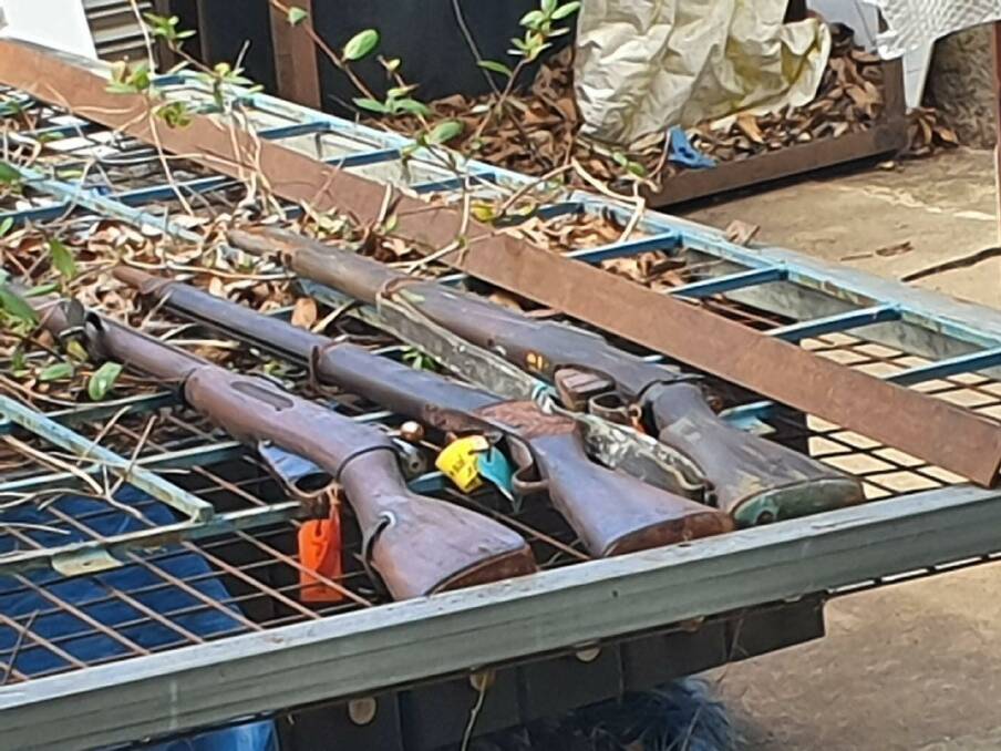 Older type guns removed from a garage at a home in Cooma on Tuesday, September 3. Image: Fire and Rescue NSW. 
