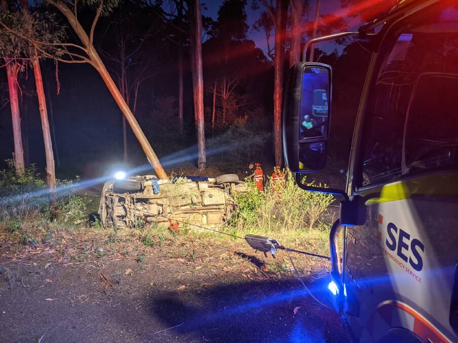 Emergency services winch out the car that had two teenagers stuck inside on Sunday, February 7. Image: Batemans Bay SES.