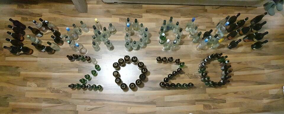 Raquel Brown and her housemates spell "lockdown 2020" with wine bottles. 