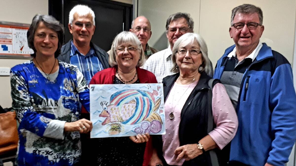The Men's Shed team came second place in the game and the "Squiggle" contest at Quota's Trivia Night. Their members were Dick Nagle, Jenny Nagle, Kay Berry, Fiona Lyall, Bruce Hughes, Steve McGourty and David Trickett.