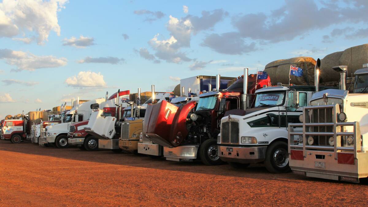 Volunteer truck drivers lined up at Quilpie in a show of friendship and solidarity.