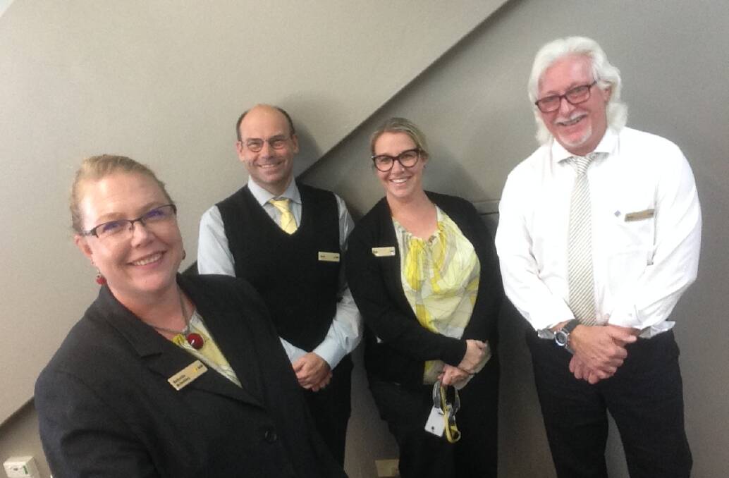 FRIENDLY FACES: Narooma Commonwealth Bank manager Rebecka Brinckley with team members David Dare, Jane Sealey and Peter Tinson.