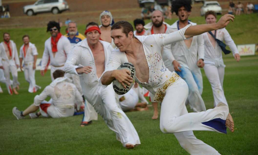 Dozens of Elvii took to Pioneer Oval on Friday night for the annual Elvis rugby match.