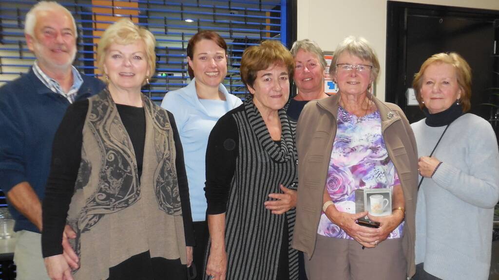 TOP QUIZZERS: Trivia-night winners Alan Redenback, Amy Adcock, Carol Hodges, July Vaca, Margaret Hayward, Marie Small and Helen Stebbing.