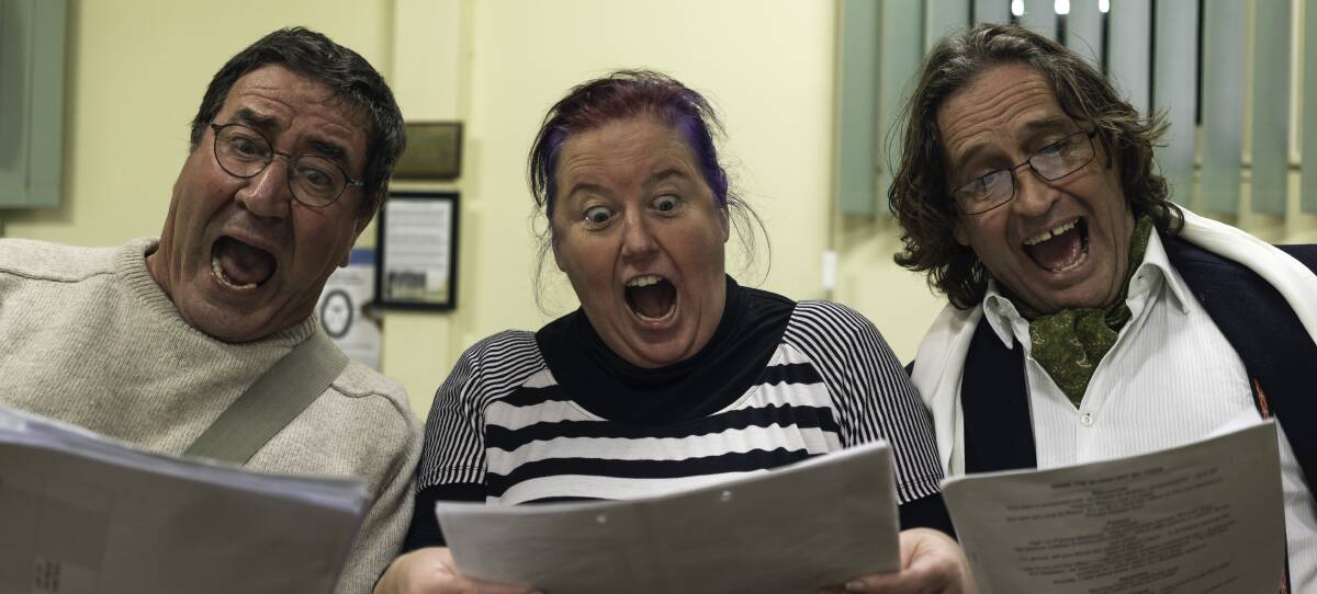 ALL ASTONISHED: Gerry Deevey, Sigña 'Ziggy' Reddy and Jeremy Kemp are open mouthed as they read through the latest script for the Moruya Red Door Theatre's latest production.