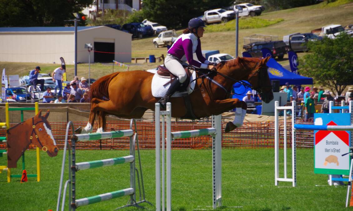 WOOLY JUMPER: Sandra Kenny wins the Get Real Get Wool Grand Prix class riding her nineteen-year-old Alando, at the Bombala Show on Saturday.