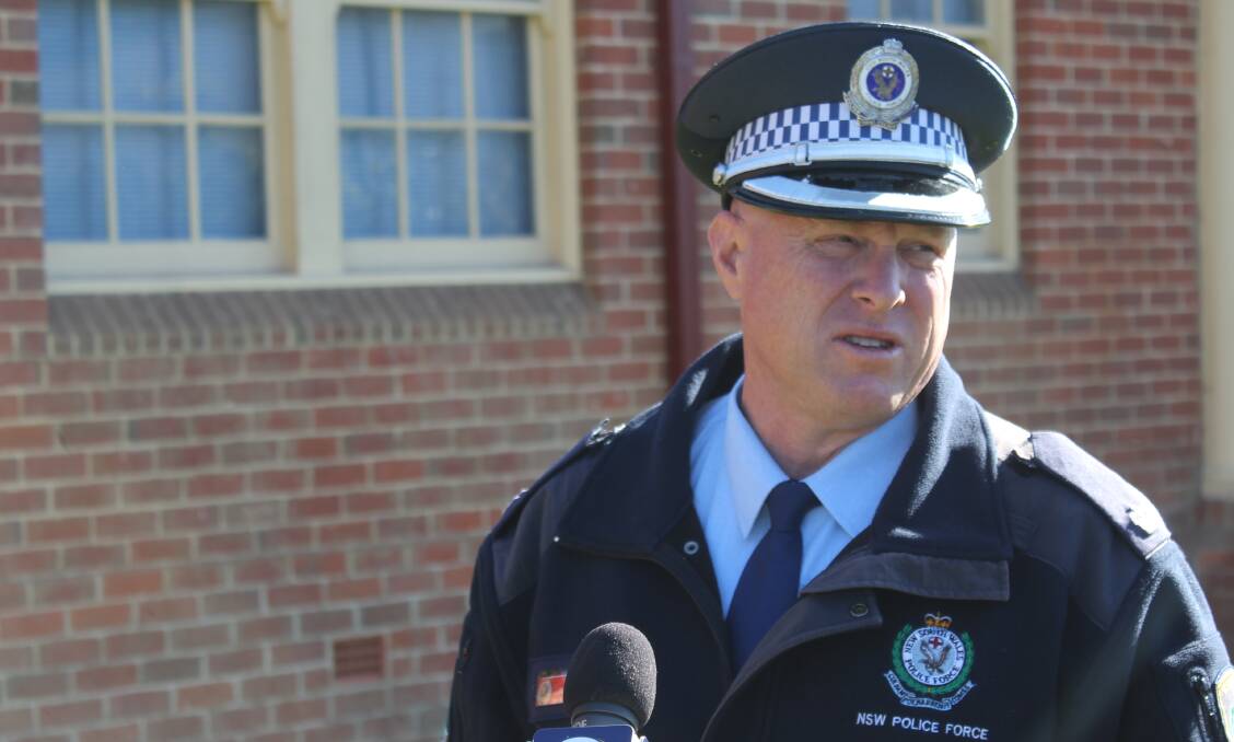 LUCKY RESCUE: Chief Inspector Peter Volf holds a conference outside Bega Police Station on Friday morning. 