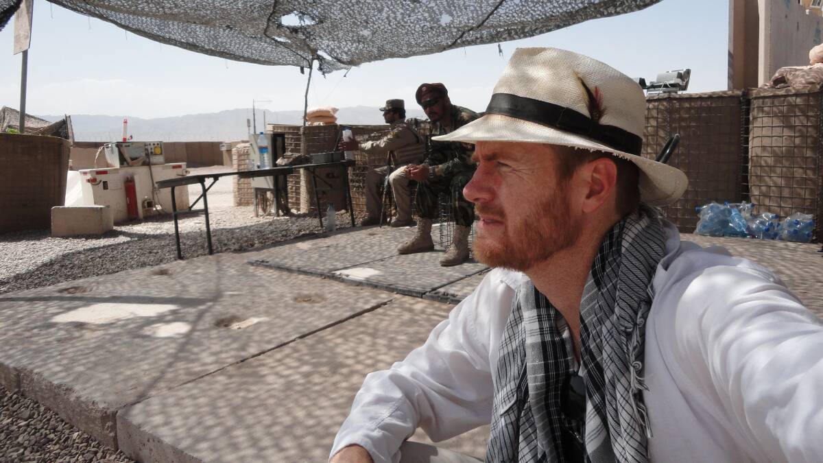 Fred Smith stops for a break while travelling through Tarin Kowt in Afghanistan. 