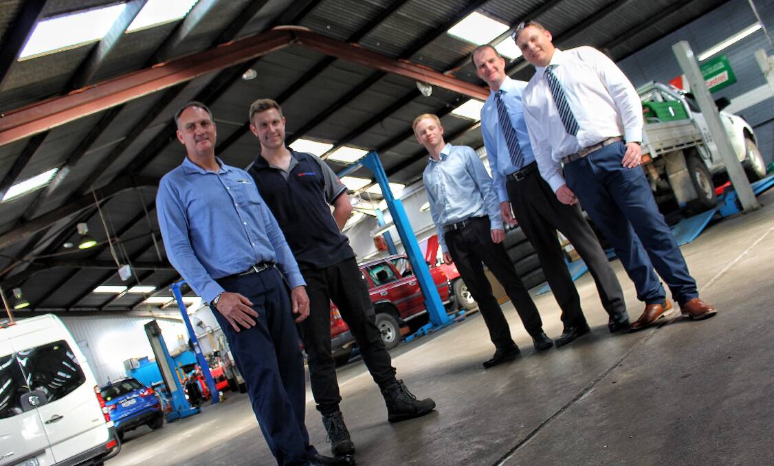 NEW HOME: The former Eden Motor Group workers who are now employed by Tarra Motors in Bega are Ronnie Booysen and his son Stephan Booysen, Daniel Williams, Scott Cusack and Sam Williams. 