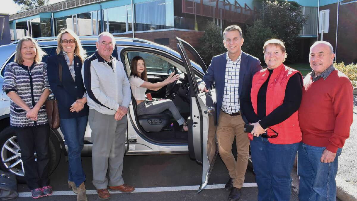 DRIVE ON: Y Drive learner driver Jaimee Allen (behind the wheel) with her mum Virginia Allen, Eurobodalla Shire Mayor Liz Innes, Y Drive mentor Jeff Halls, Bega MP Andrew Constance, Y Drive coordinator Angie McMillan and councillor Phil Constable at the June 15 funding announcement in Moruya.