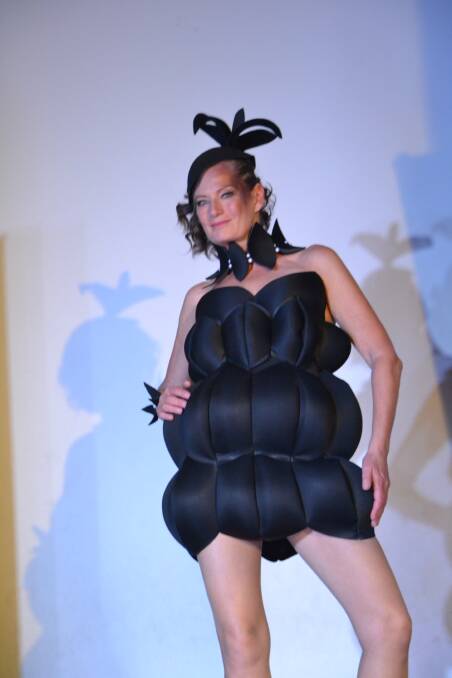ART REINVENTED: Designer Julie Brennan captured the crowd's attention with her creative 'Booby Trap' dress (pictured) at Sunday's EFTAG fashion parade in Moruya as part of the River of Art Festival.