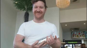 Brendan Stewart was very chuffed to order the very first Burrito made at the new Batemans Bay Zambrero. He said it was delicious. 