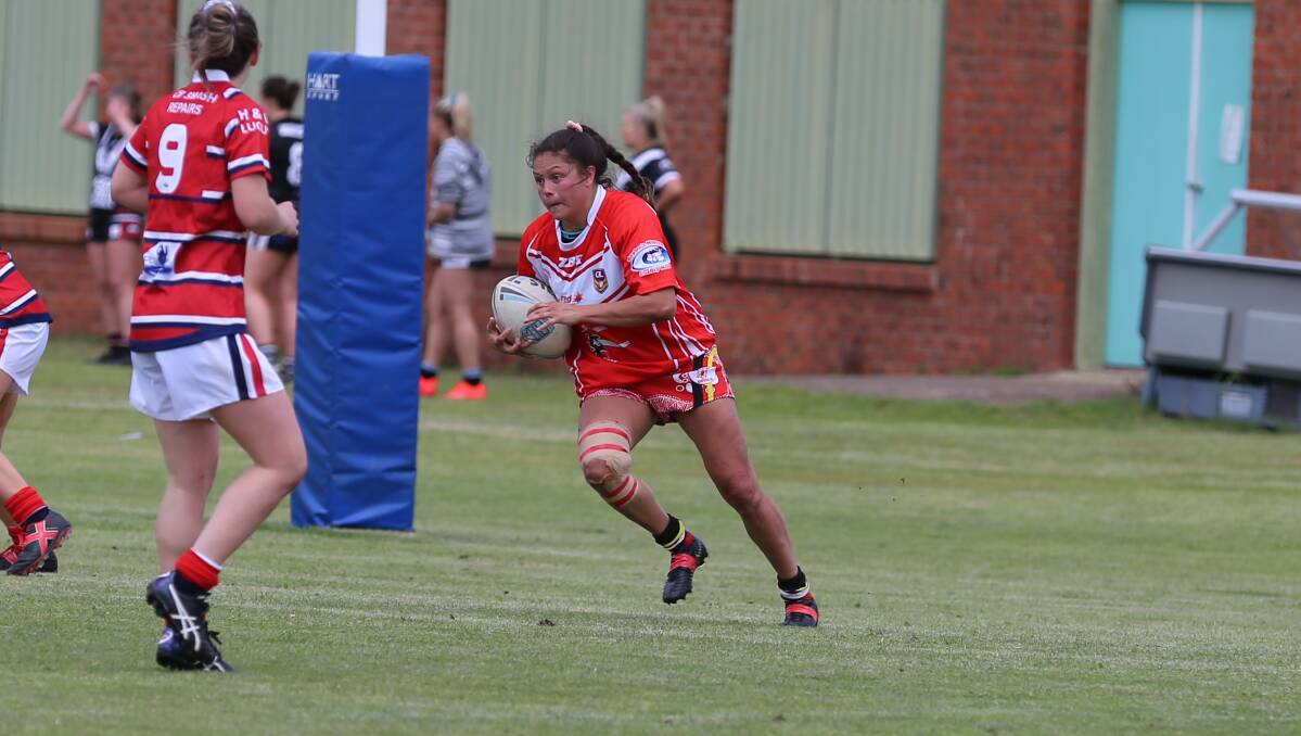 Speedy: Narooma Devil Wrylka Colburn makes a burst out of her own in-goal following a strong set by the Bega Roosters during their 18-6 loss on Saturday. 