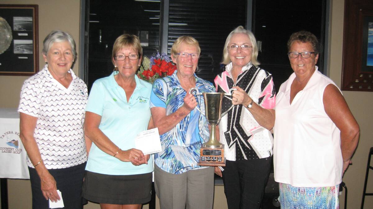 Kay Murray presents the Murray Cup to the winners from Pambula Merimbula golf club  Lynda Jolly, Pam Eaton, Carlene Ramsay and Wendy Fleming.