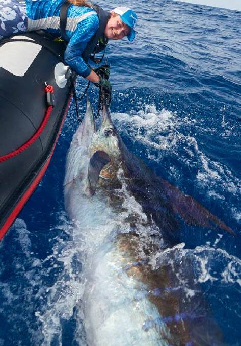 Photos of Georgia Poyner and her big marlin