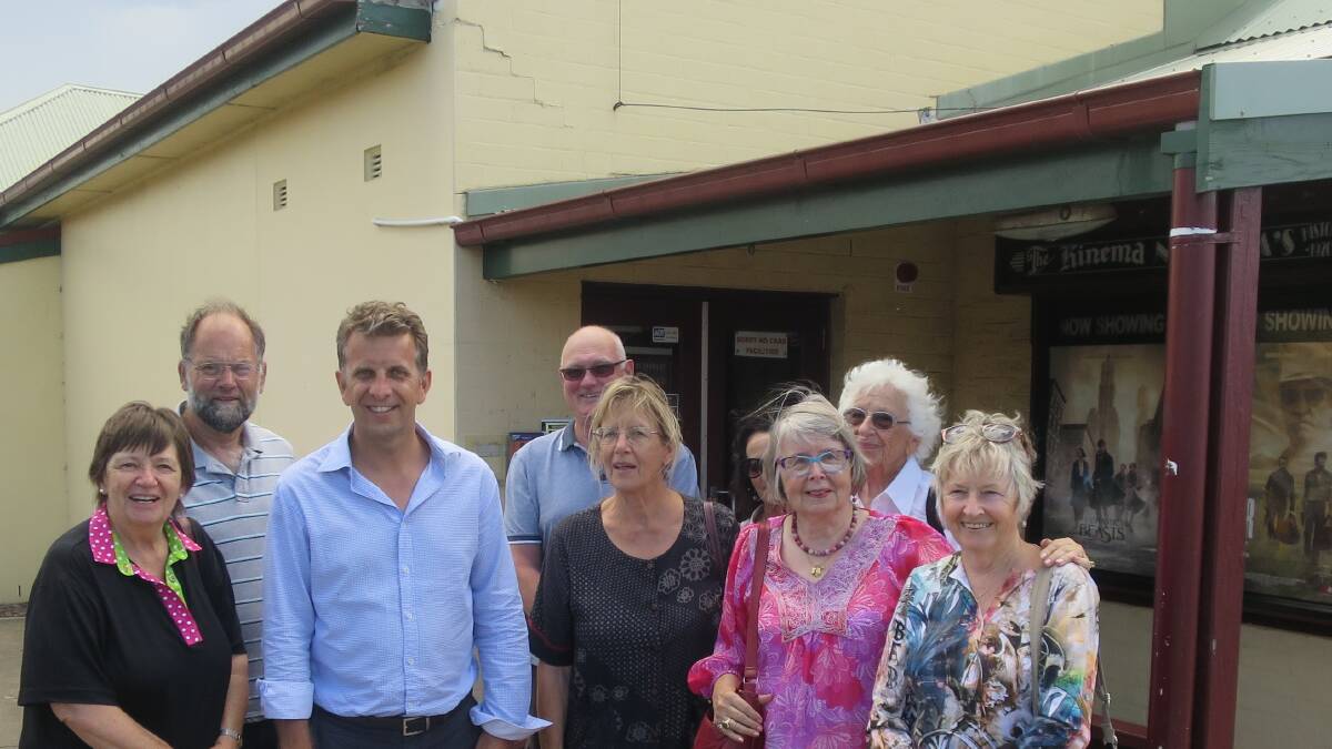 NSW Minister for Transport and Infrastructure and Member for Bega Andrew Constance congratulated Narooma School of Arts committee for its successful Grant applications for the next stages of work on the community-owned Memorial Hall. With him are School of Arts representatives Laurelle Pacey, left, John Doyle, Bob Aston, Joy Macfarlane, Jenni Bourke (half hidden), Ingeborg Baker, Mina Watt and Marg Ingamells. wo people not in the photo but instrumental in securtng the grants were Anne McCusker and Annmaree O'Keefe. 