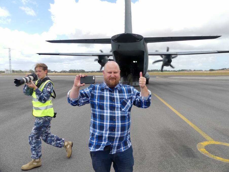 BUSHFIRE MISSION: The Islander journalist Stan Gorton travelled with CFS volunteers on a RAAF transport plane to Mt Gambier, live streaming along the way. It was one of the many stories on the KI bushfires covered last summer. 