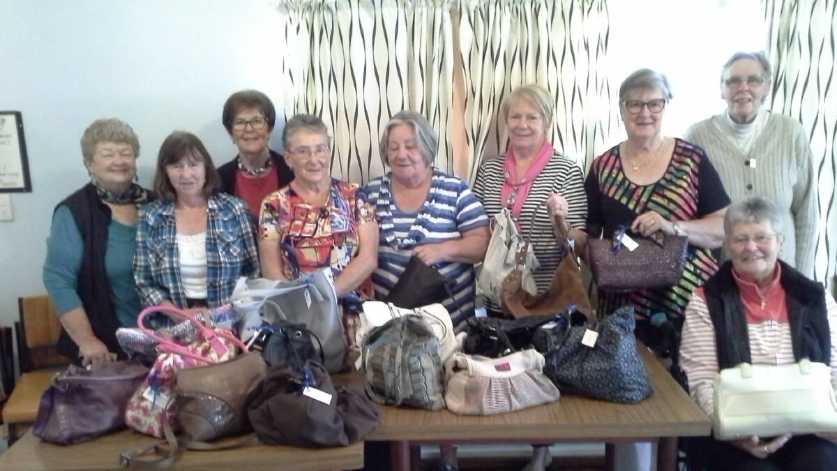 CWA HELP: Narooma CWA members with 16 “Bags for Dignity” to be delivered to victims of domestic violence.