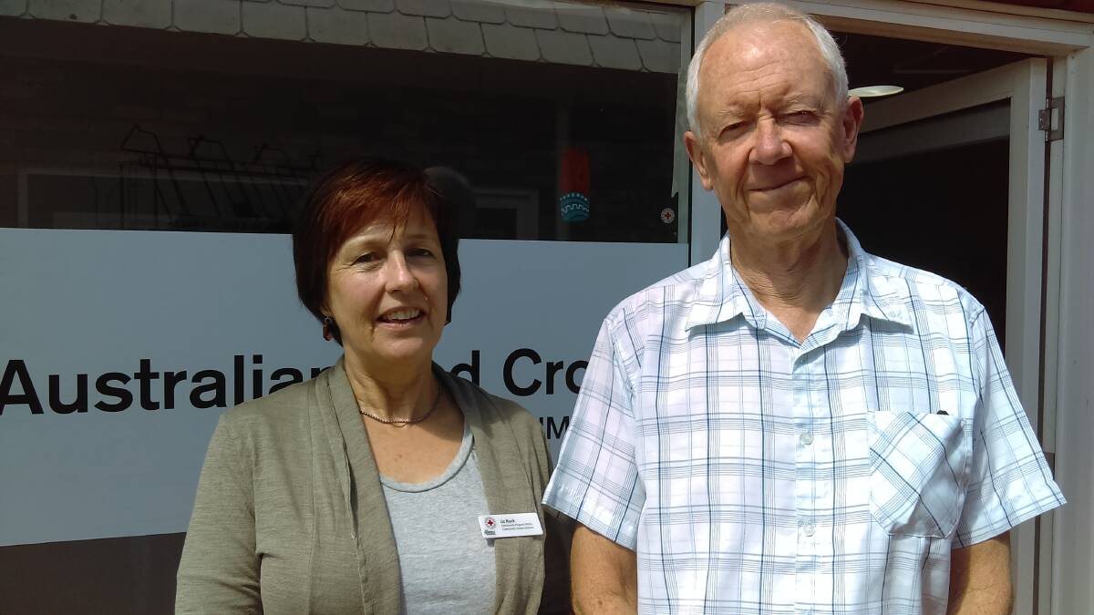VISITING VOLUNTEER: Red Cross community visiting coordinator Liz Ruck pictured with volunteer visitor Peter Tough of Bodalla.  