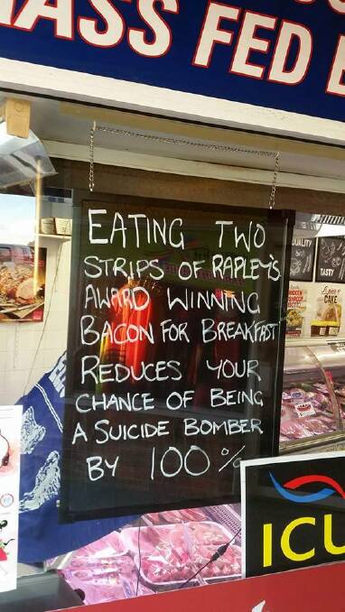 Narooma butcher Jeff Rapley says he did not mean to cause any offence with a sign meant to boost bacon sales. 