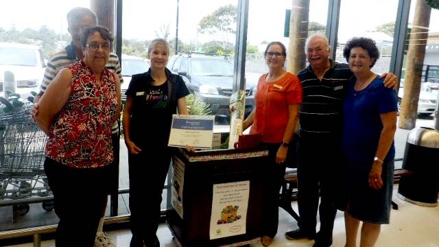 GIVING THANKS: Narooma Conference of the St Vincent de Paul Society members Pat, Bill, Mike and Anne with Horizon’s Julie and Woolworths Lisa.  