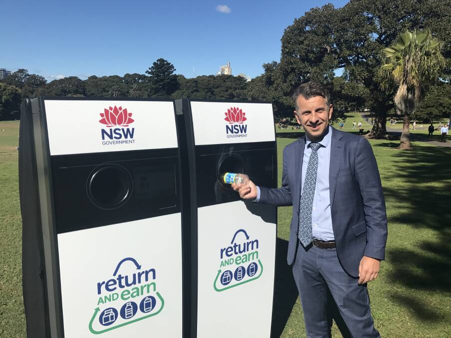 Member for Bega Andrew Constance with the reverse vending machine kiosk that will be installed at the Woolworths at Bega as part of the state’s container deposit scheme rollout.