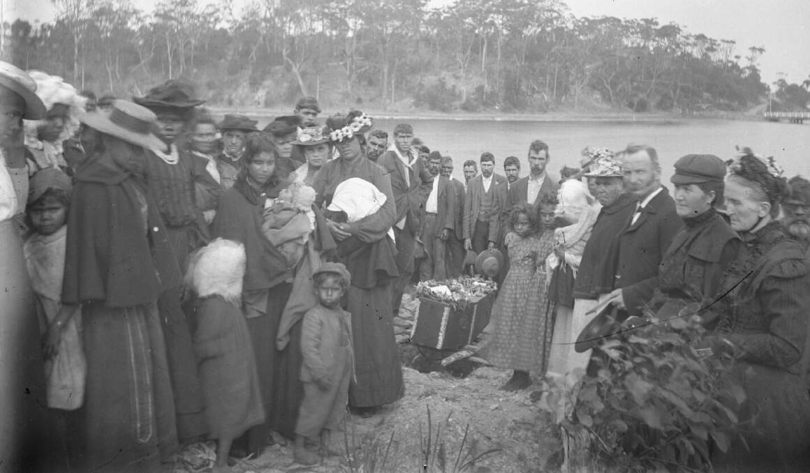Funeral of Queen Narelle, Wallaga Lake, c. 1900. Emily Wintle is sitting second from right, wearing a peak cap. Picture: NLA, William Corkhill nla pic-an2511328-v