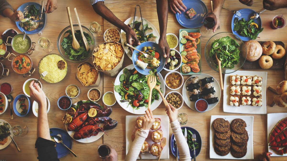 Conversation starter: Filling your table with food from one end to the other means guests have to talk to each other and reach over in order to get their food, ensuring conversation flows throughout the meal. 