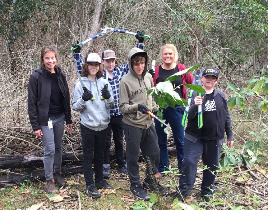 Eurobodalla Shire Council worker Emma Patyus with, year 8 Narooma High School students Cameron, Jayden, Caleb, with Links to Learning coordinator Julia Willson (SRBEC) and Dom at Little Lake.