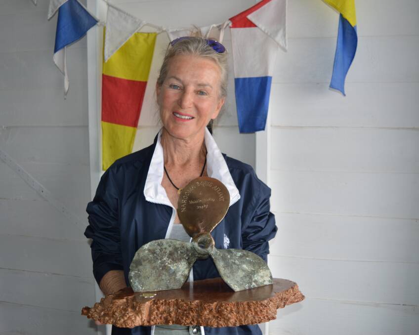 Boat's Afloat general manager Susanna Duveen with the Narooma Boats Afloat Malcolm McKay perpetual trophy that she designed for the best boat at this years 14th annual Narooma Boats Afloat. Photo Jeanne Medlicott