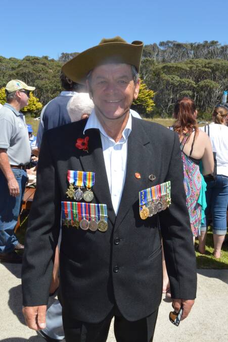 FAMILY HONOURS: Narooma's Trevor Bennett wearing his and his family's medals on Remembrance Day.