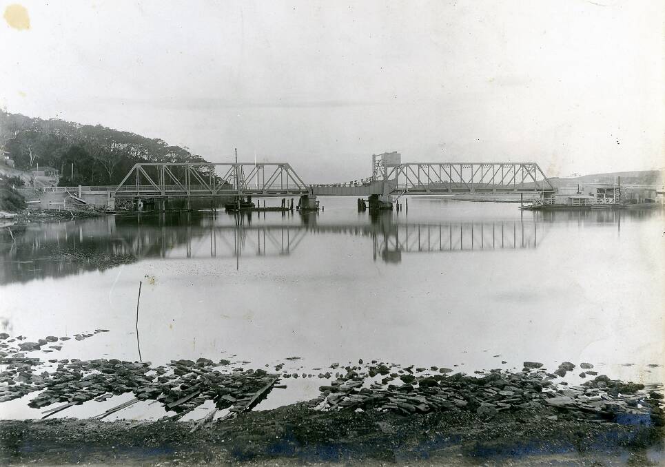 The completed Narooma Bridge on opening day, with the old vehicle ferry beside it.
Photo Narooma Historical Society Archives, courtesy Cyril Renwick Archives - Morison & Bearby Newcastle.