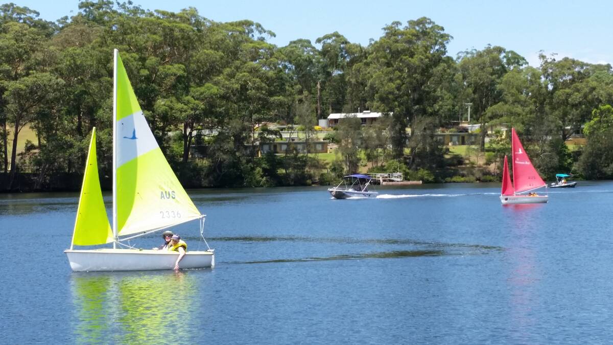 Batemans Bay Sailability members Edie and Michael sailing on the Clyde River at Nelligen.
