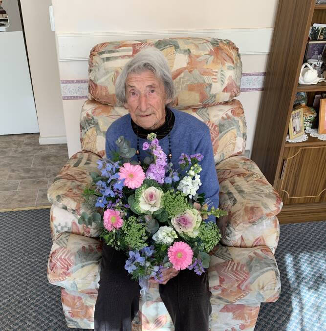 Century: Eileen Penman deserves all the flowers in the world for keeping up her bowls at 100 years old.