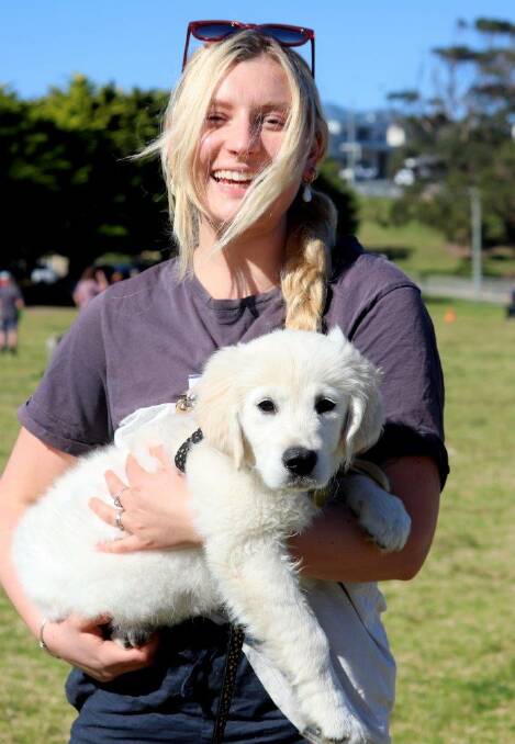 All smiles: Kali and her pup Shirley having fun at Narooma Dog Training Club Obedience Class.