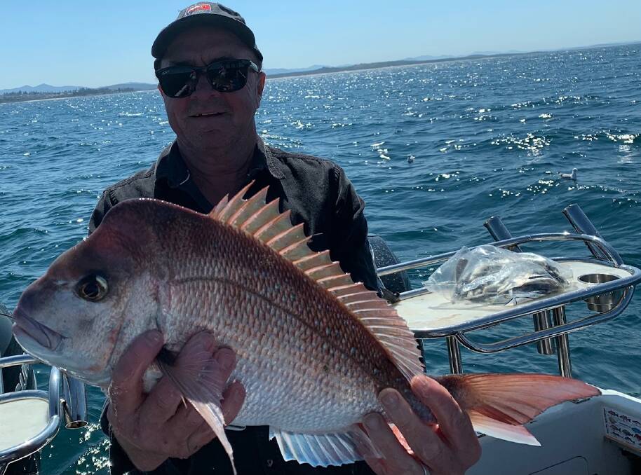 Narooma Sport and Gamefishing Club angler Bill Baillie with a beautiful snapper caught off Narooma.