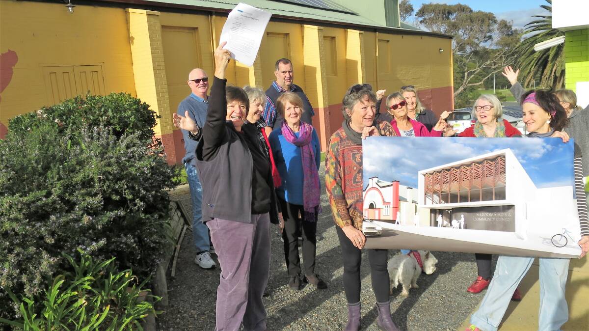 Some of the delighted School of Arts team celebrate the news that Council has given Development Consent for the Narooma Arts & Community Centre project on site. School of Arts president Jenni Bourke is front right.