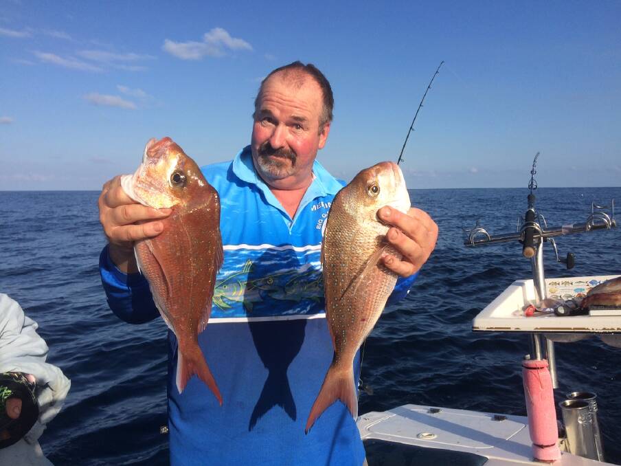In preparation of the Merimbula fish clubs Snapper Classic on May 22 and 23, David Magilton of Fishpen show off a lovely pair of reddies taken out of Kianinny.
