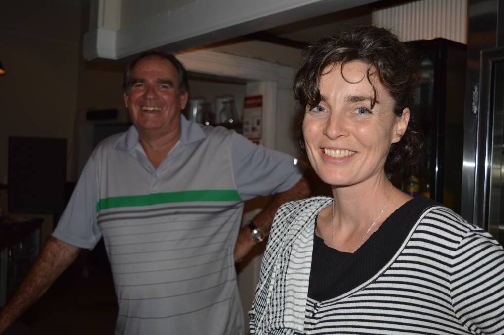 Bodalla Hotel publican Ron "Jacko" Jackson with bar attendant Angie Bryce are looking forward to Saturday's belated New Year's Eve party.
