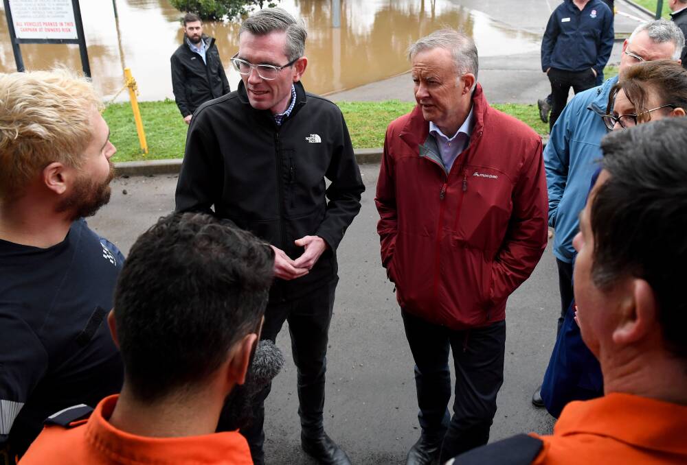 NSW Premier Dominic Perrottet and Prime Minister Anthony Albanese meet with SES volunteers in Richmond. Picture: AAP NSW Premier Dominic Perrottet and Prime Minister Anthony Albanese meet with SES volunteers in Richmond. Picture: AAP