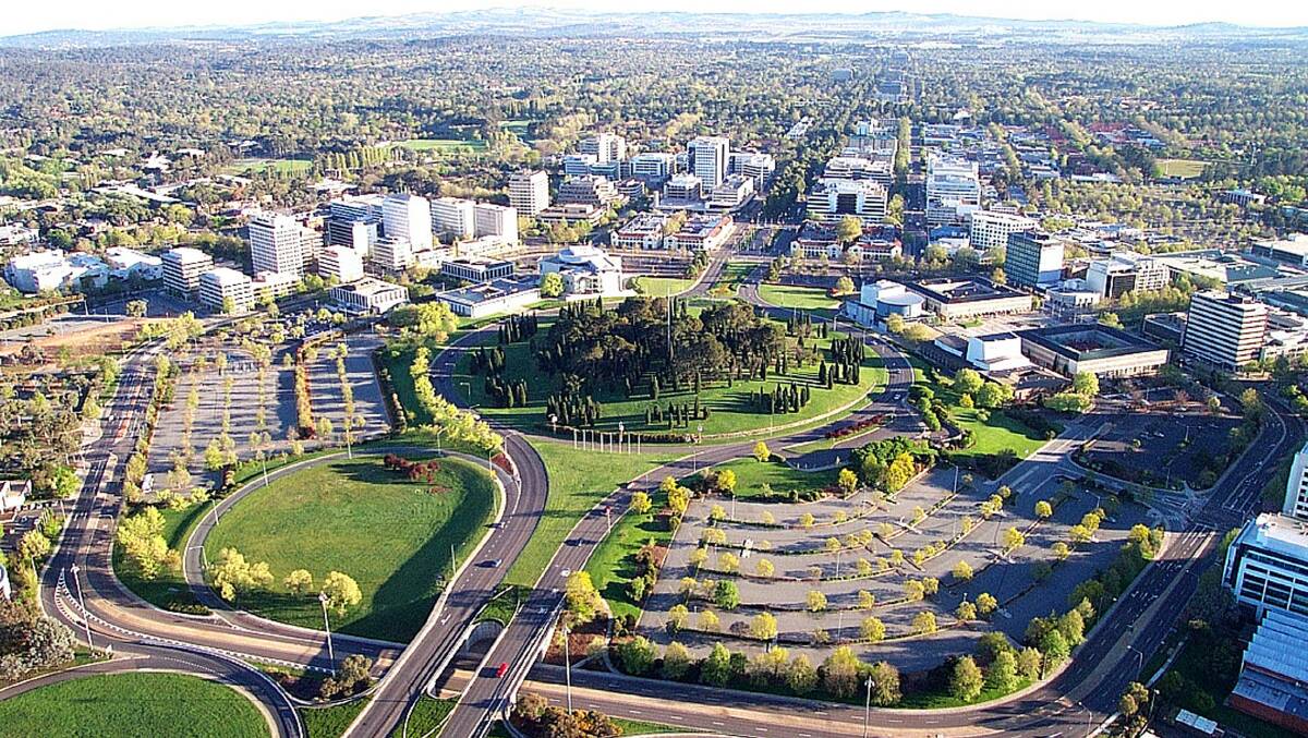An aerial view of the city of Canberra. The idea ACT residents should not travel to the coast is controversial, to say the least.
