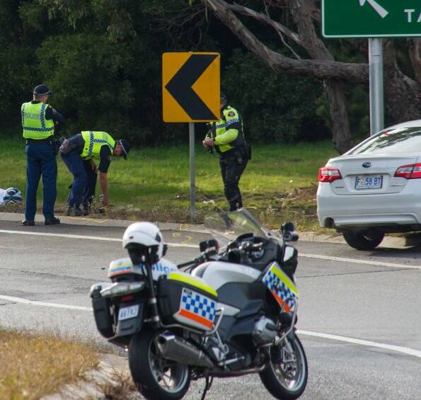 MOTOCYCLE CRASH: A man came off his motorcycle on the Bass Highway at Prospect on Sunday morning. Photo: Phillip Biggs