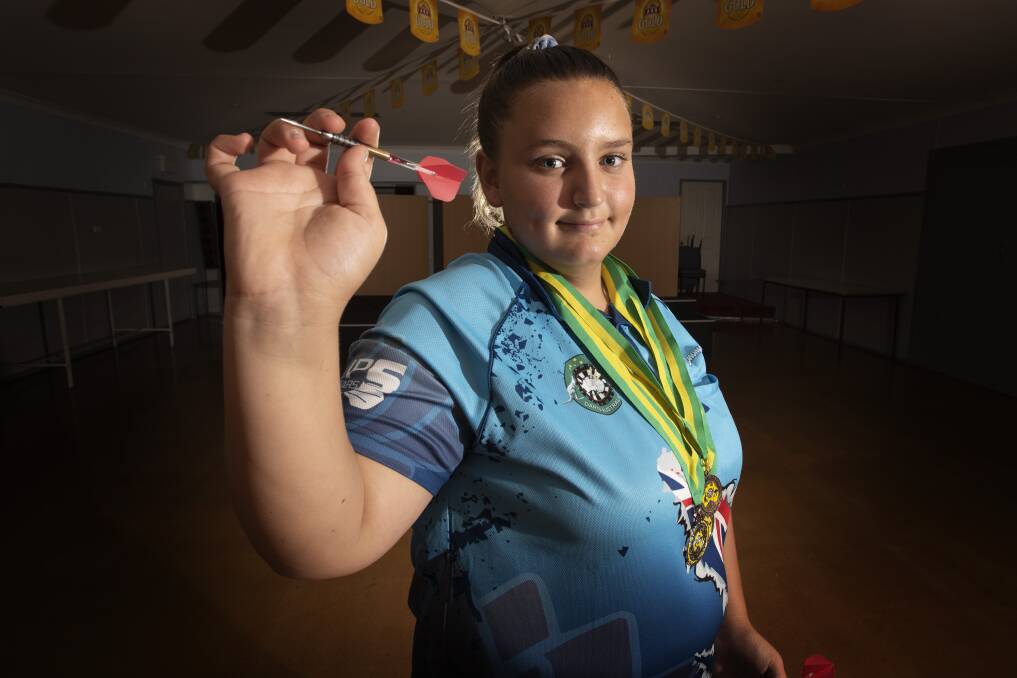 Bullseye: Gemma Spence has enjoyed a rapid rise through the junior darts ranks and recently represented NSW in the country's pinnacle event. Photo: Peter Hardin 060220PHC013