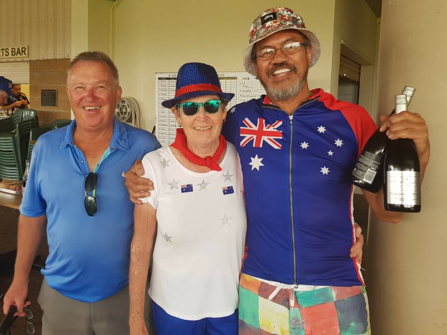 Bermagui Country Club: Peter Schmidt (Men's Golf President) awarding Australia Day best dressed to Marion Calder and Peti Fereti.