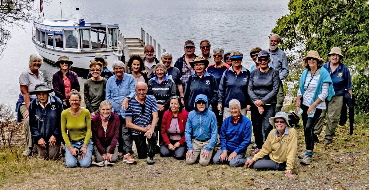Trip away: Dalmeny Narooma Bushwalkers take a break by the lake near Mallacoota, Victoria.