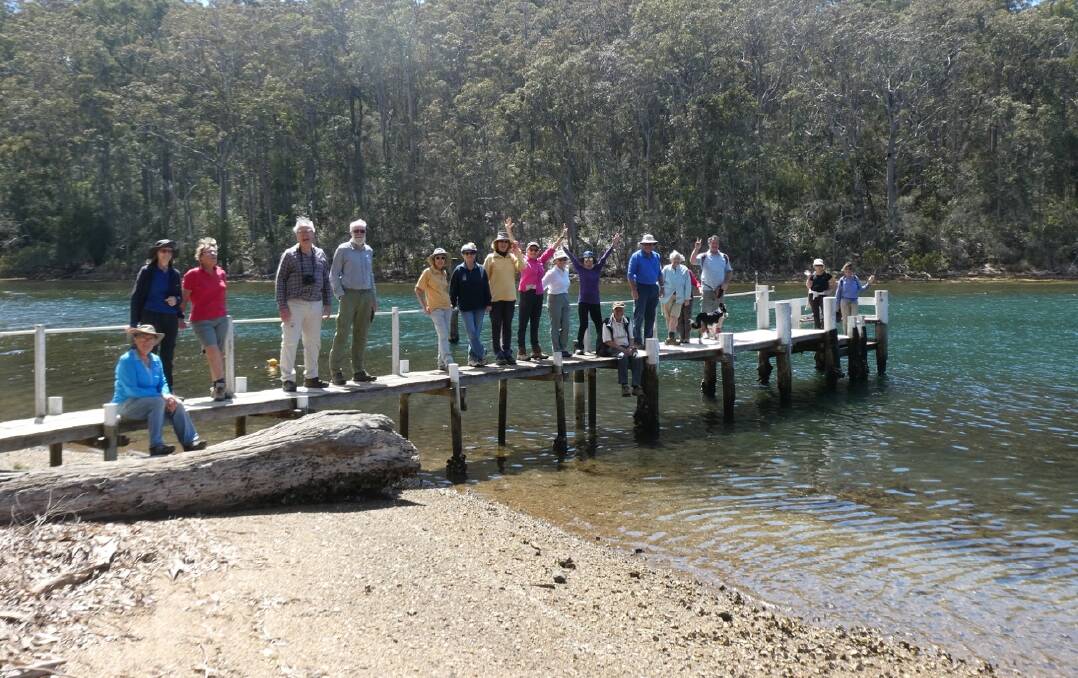 Final time?: Dalmeny Narooma Bushwalkers gather on the jetty at Freshwater Bay after their Paradise Point walk.