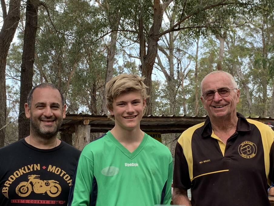 On target: First-time junior shooter Zane Gurven, who took out the junior section, with sponsor Gary Georgiou and Club President Nev Brady.